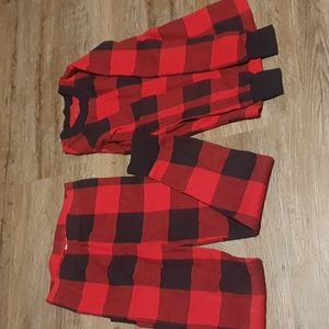 Like new, Unisex red and black plaid, snug fit, thermal, pajamas. Size 7.